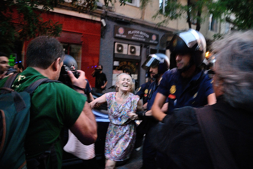 Fotorreportero manifestación policia antidisturbios